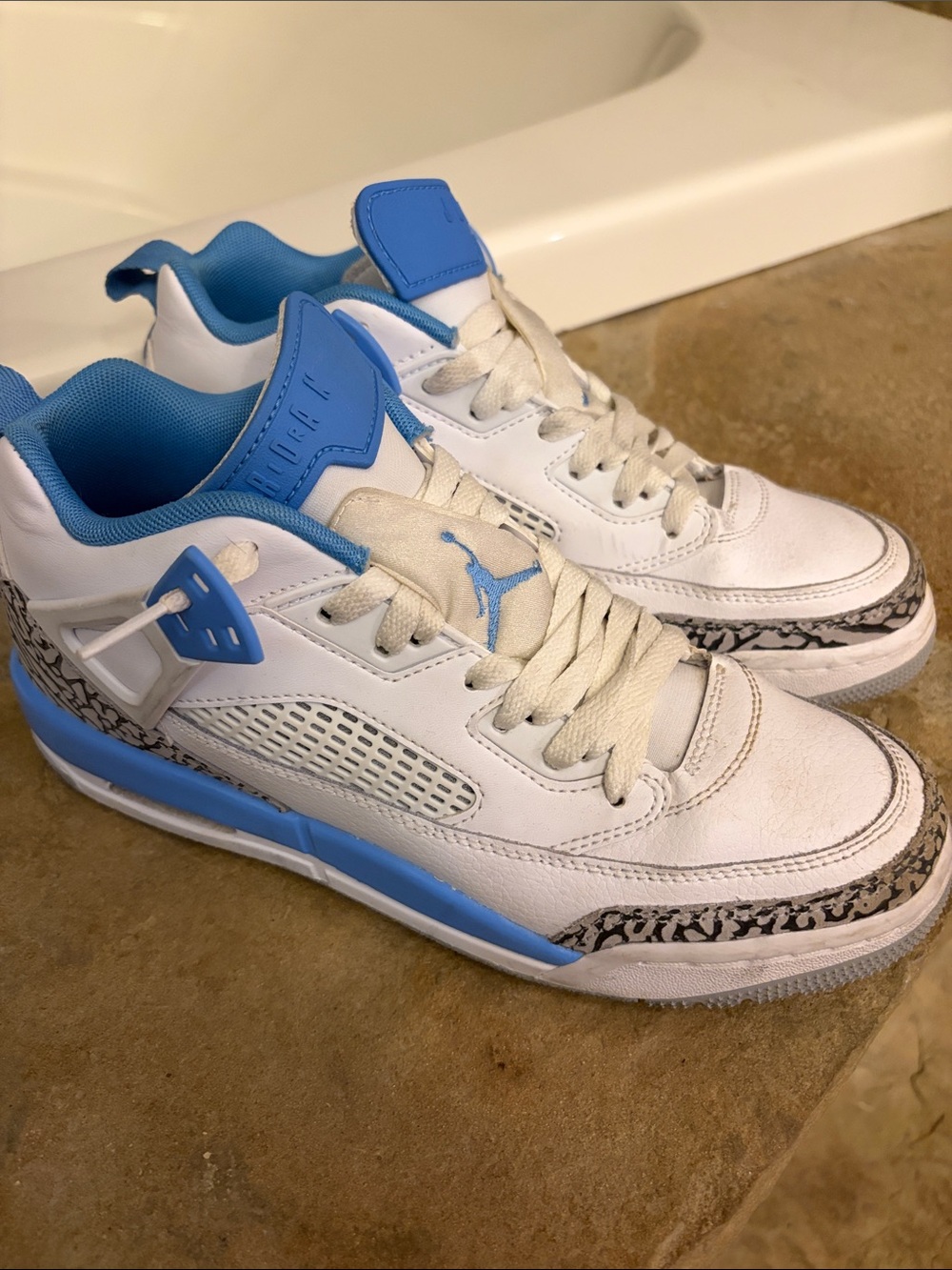 Nike Kids White and University Blue Jordan Retro Sneakers